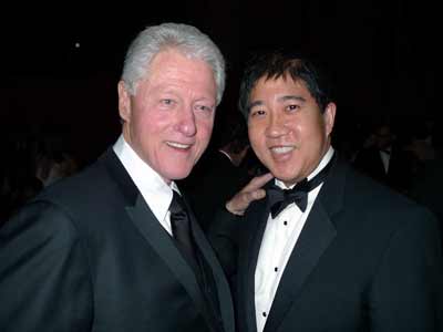 President Bill Clinton and Stephen Mao of Studio Mao corporate at amfAR